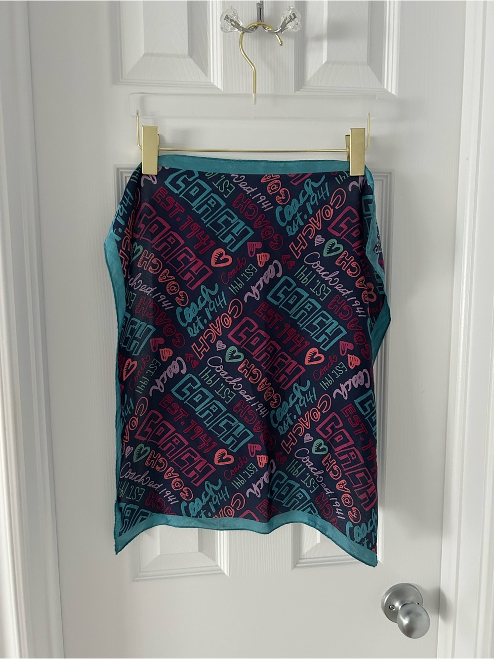 Coach Poppy neck scarf